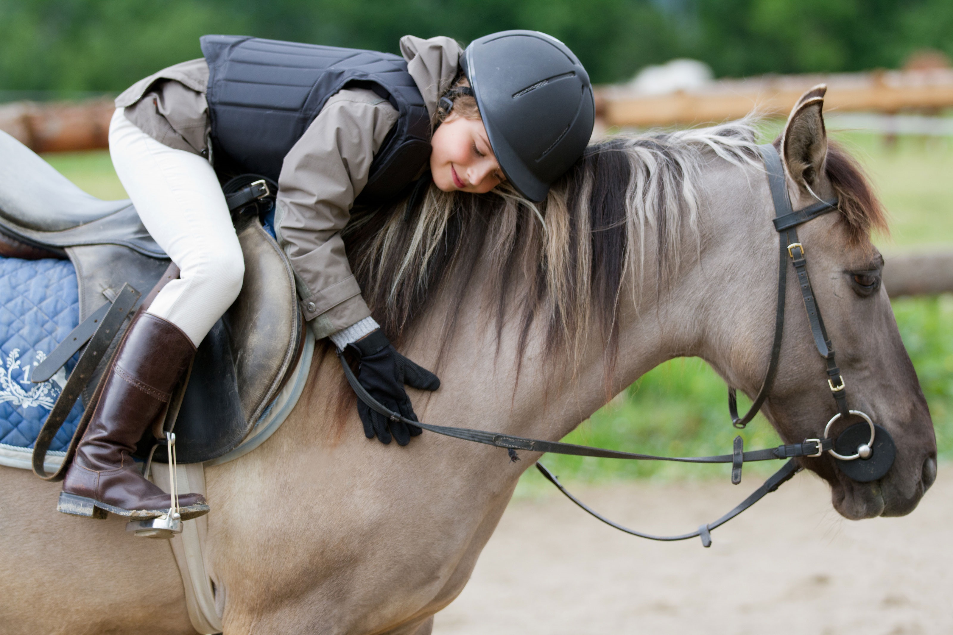 child riding horse